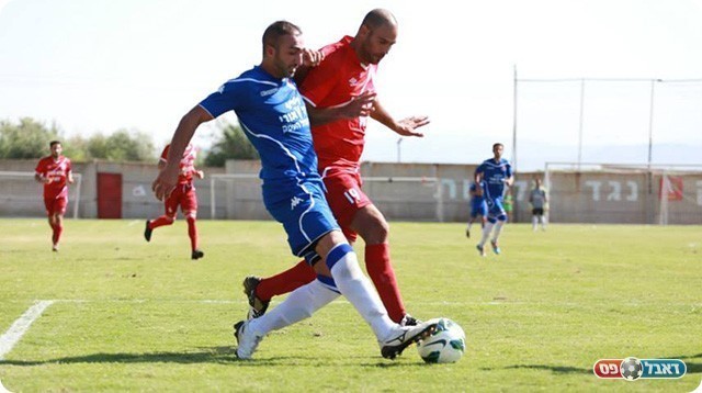 איש המשחק. רגב וולק (באדום) (עדי מלול)